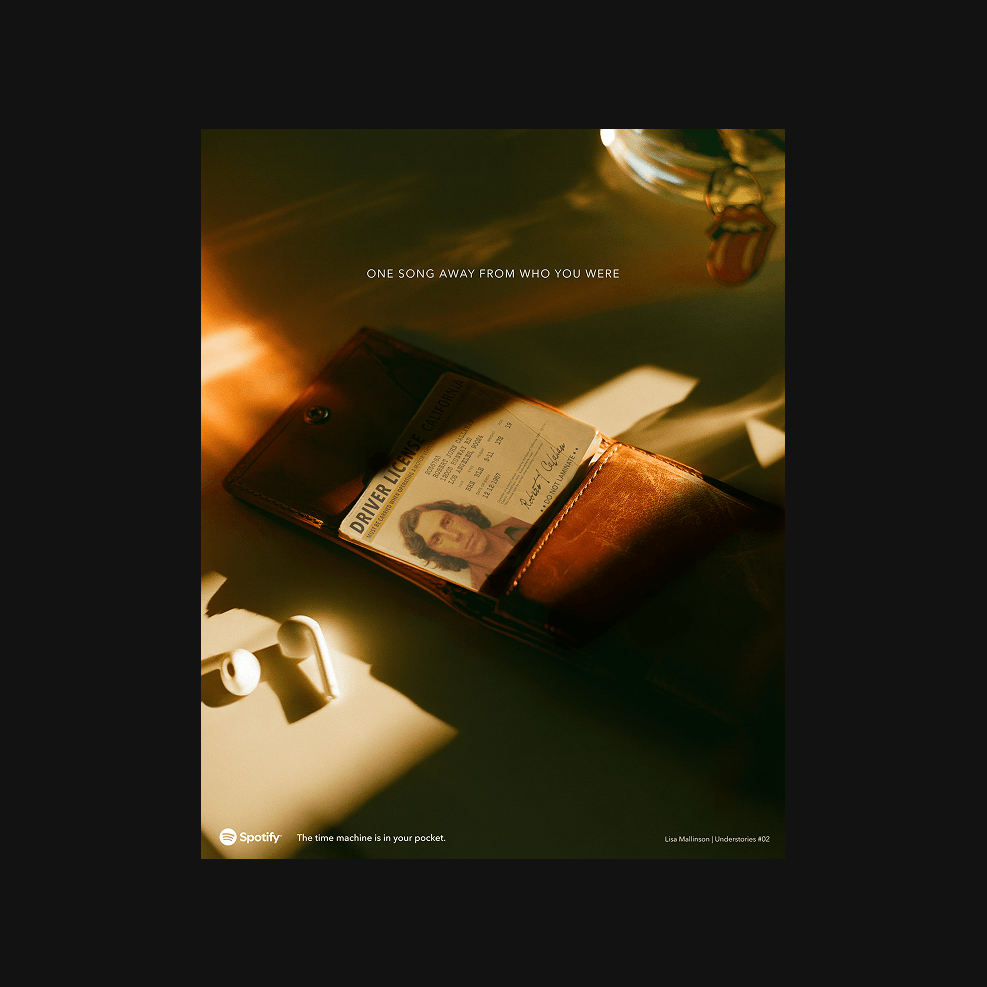 Understories, a personal creative project exploring brands through a human lens, shown through a Spotify concept poster featuring a vintage driver’s licence and earphones.