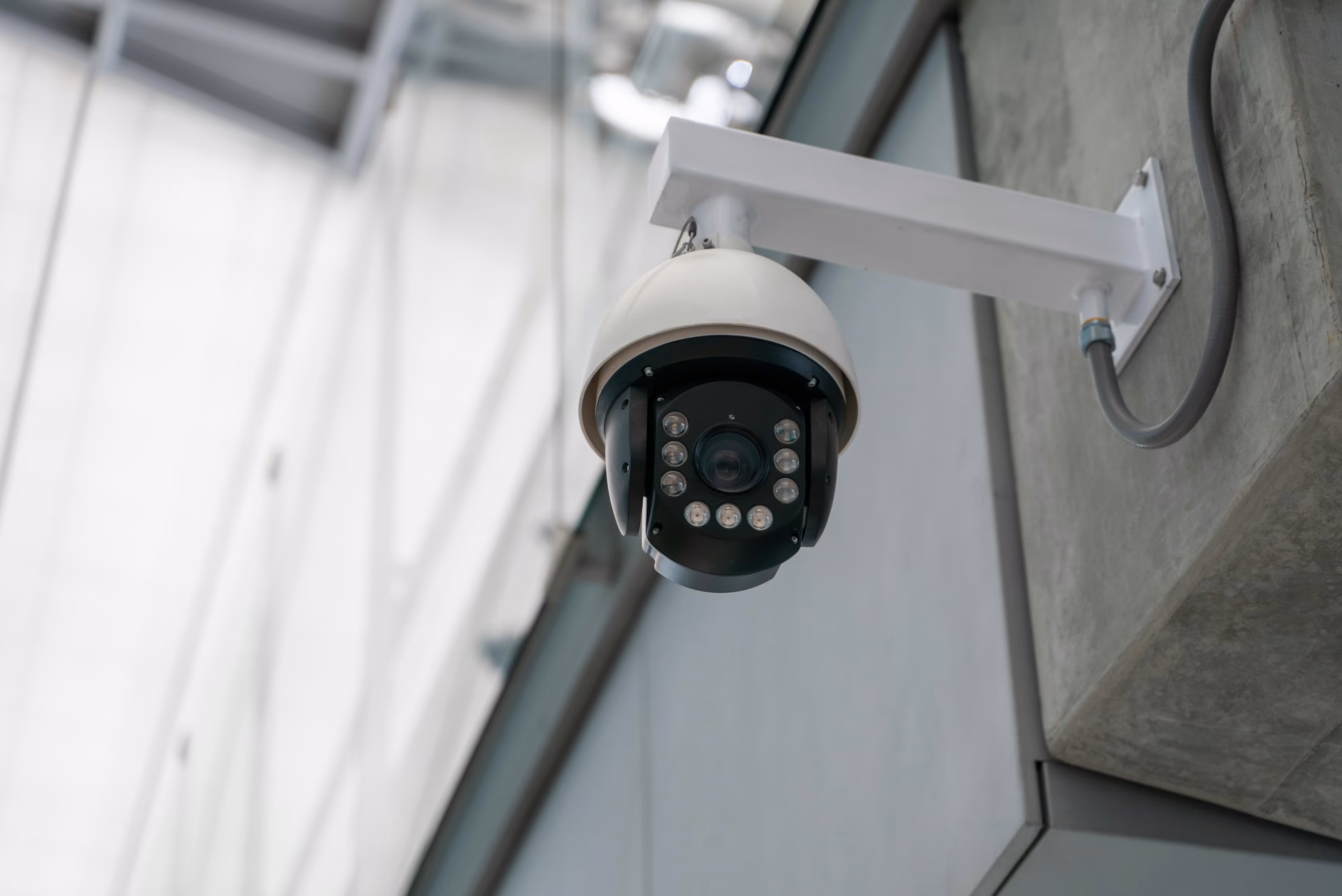Security camera mounted on a concrete building