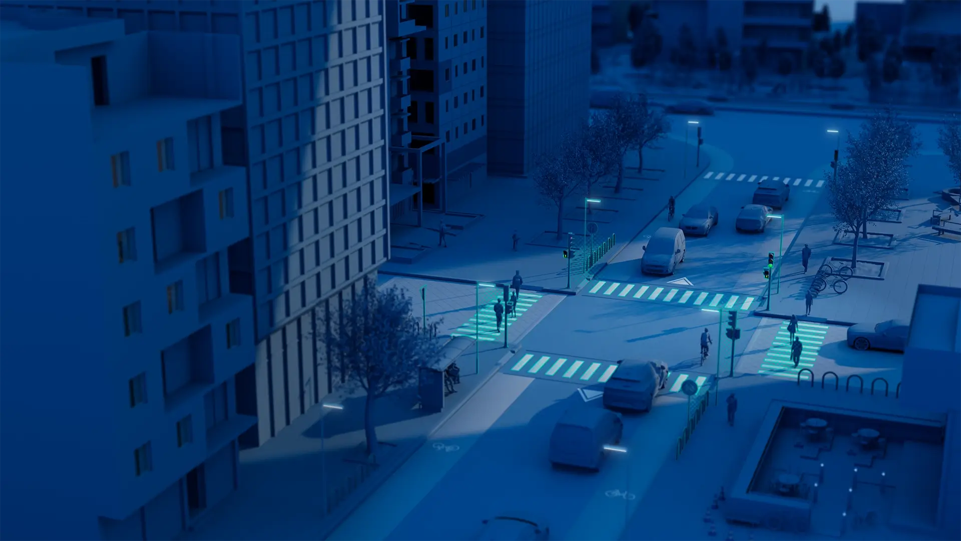 Smart city street intersection with pedestrians, vehicles, and crossings visualized in a blue digital urban environment