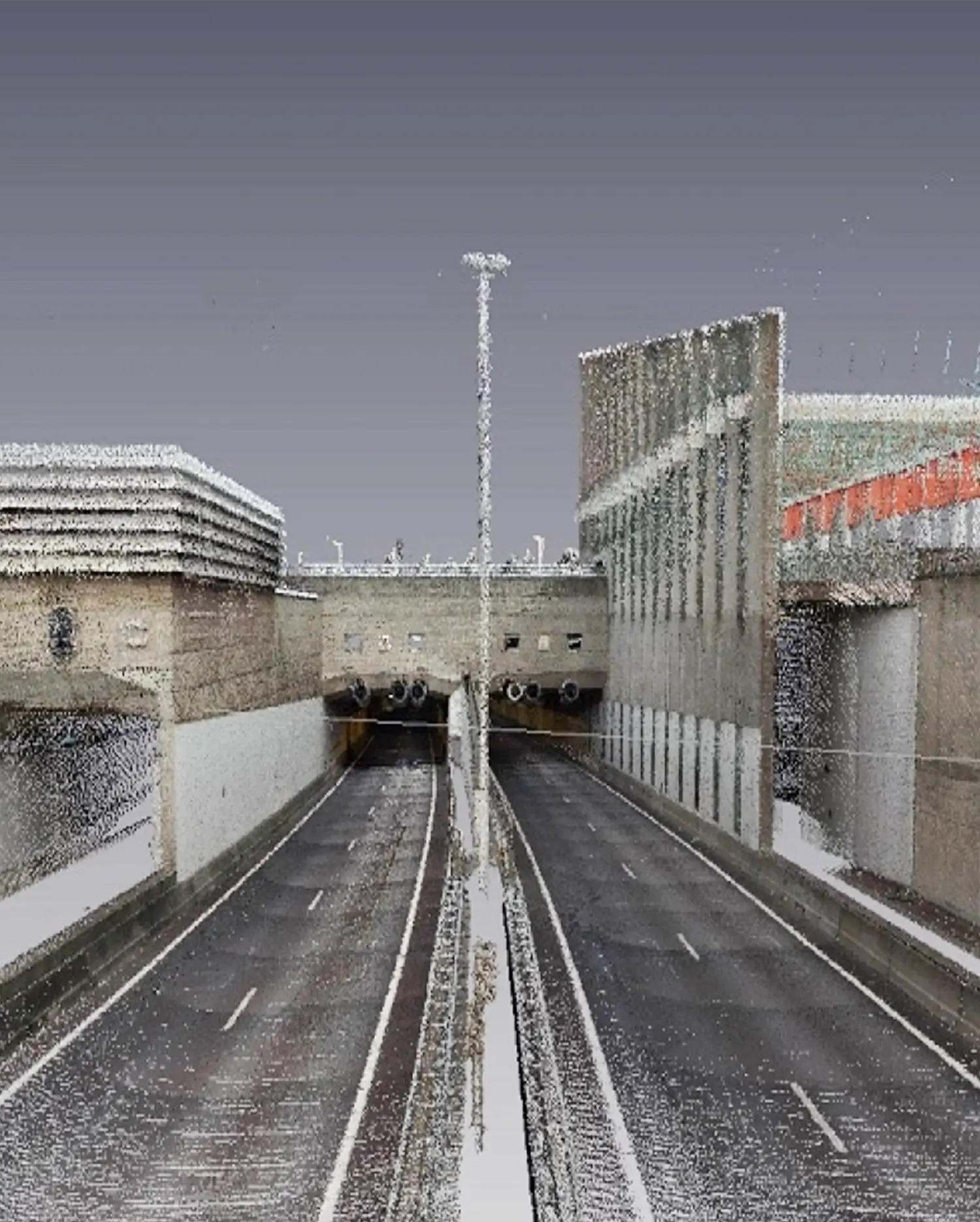 LiDAR point cloud view of a multi-lane road leading into a tunnel entrance with surrounding infrastructure