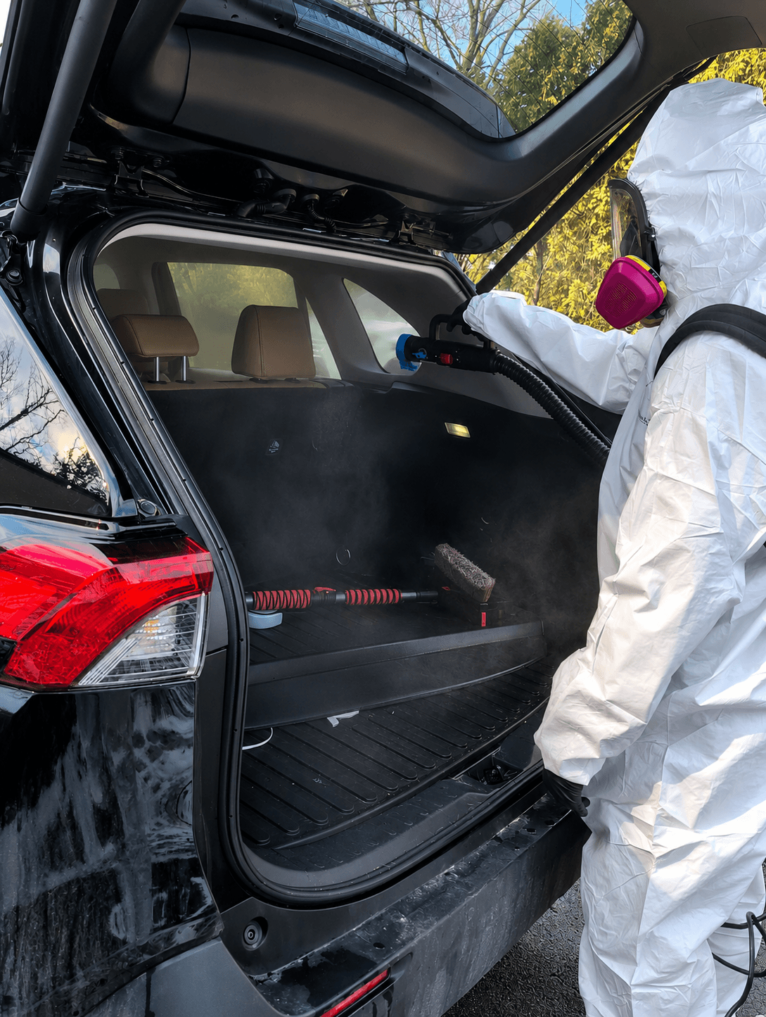 Biohazard vehicle decontamination and cleanup service