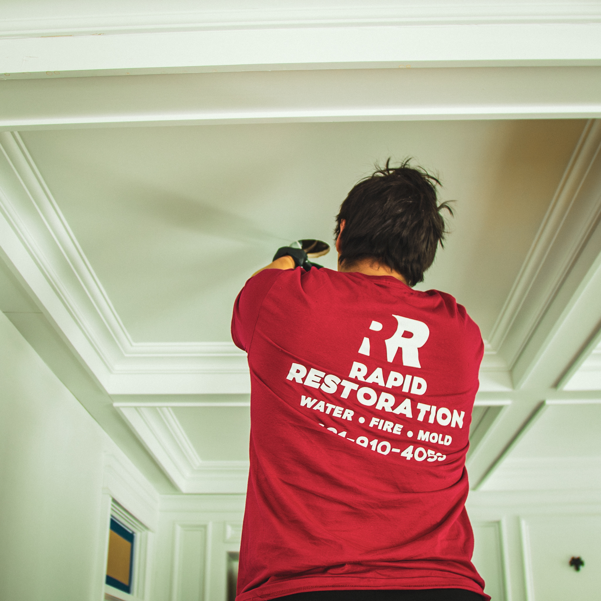 Restoration technician at work