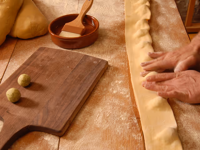 a chef preparing house-made ravioli