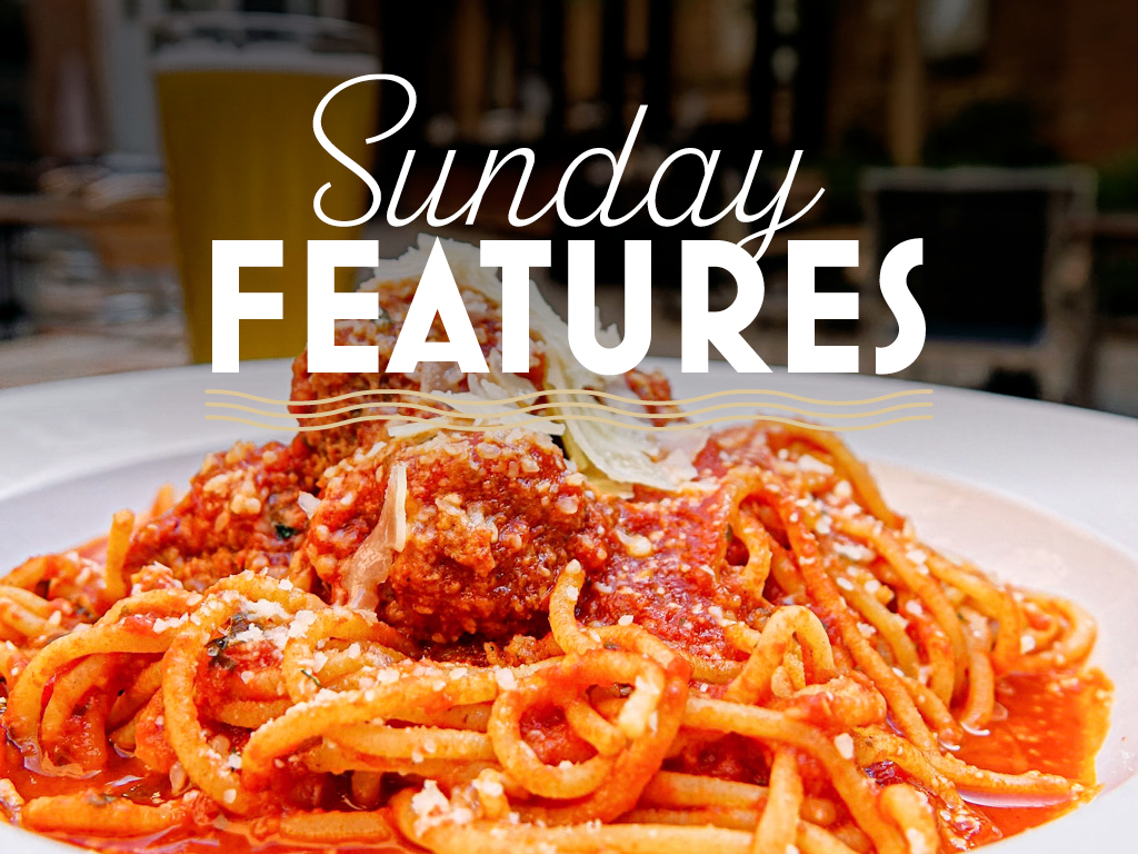 a plate of spaghetti and meatballs with the words Sunday Features