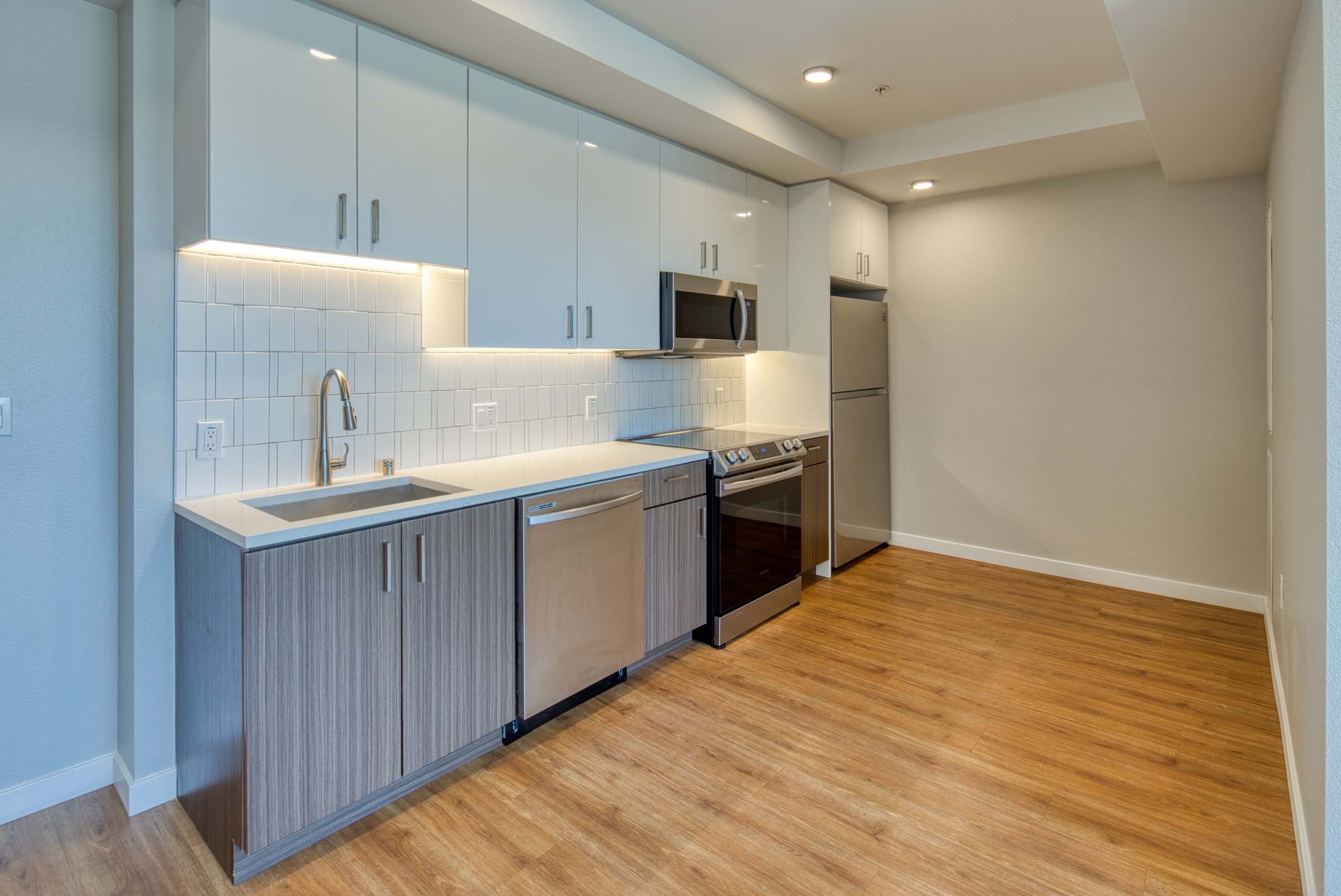 Kitchen with brown and white cabinets