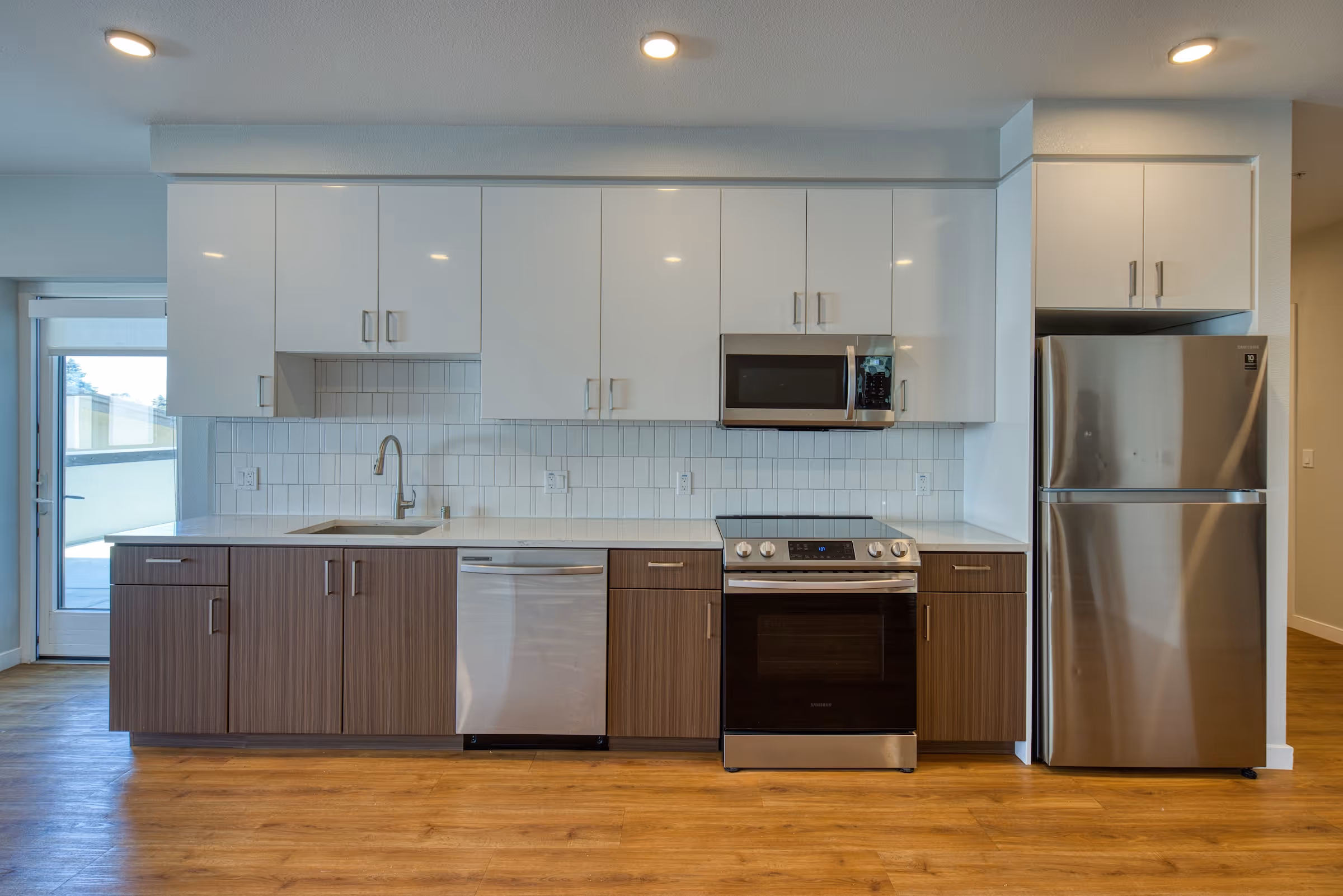 kitchen with brown and white cabinets
