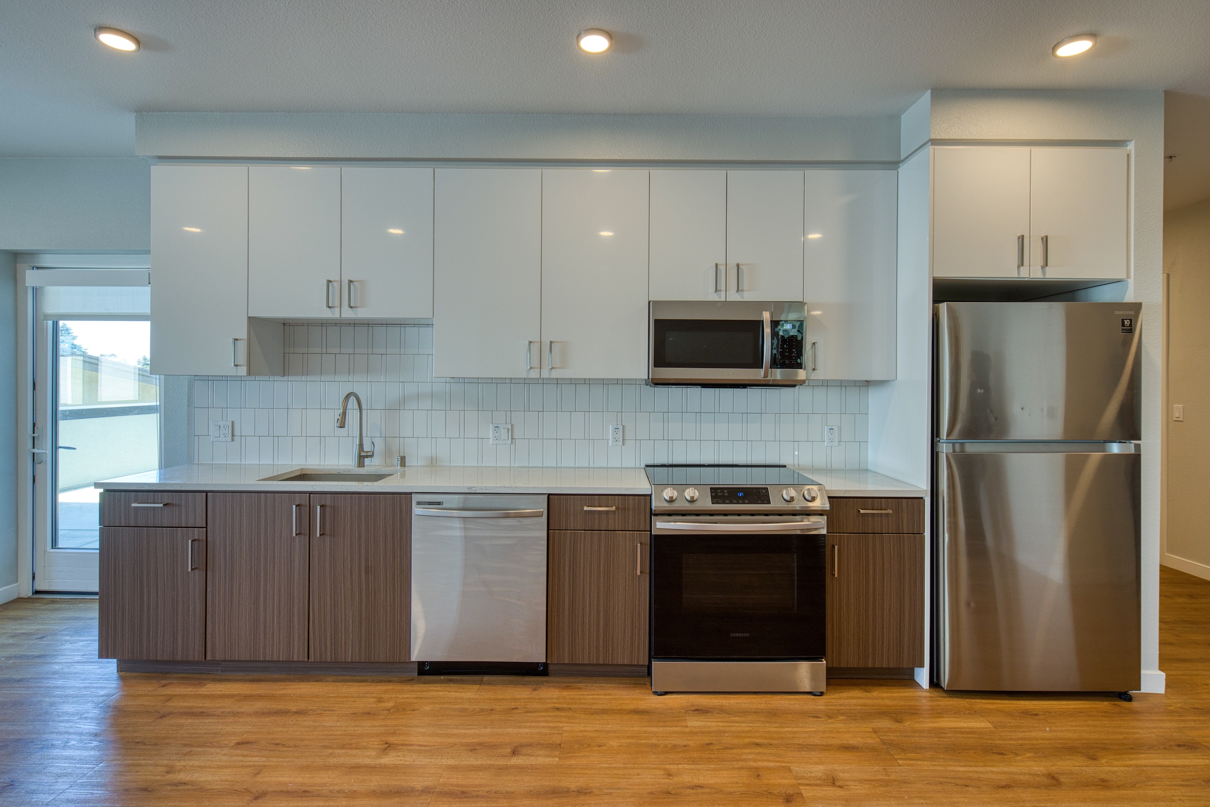 kitchen with brown and white cabinets