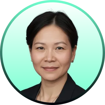 Portrait of a middle-aged Asian woman with short black hair wearing a black blazer against a teal background.