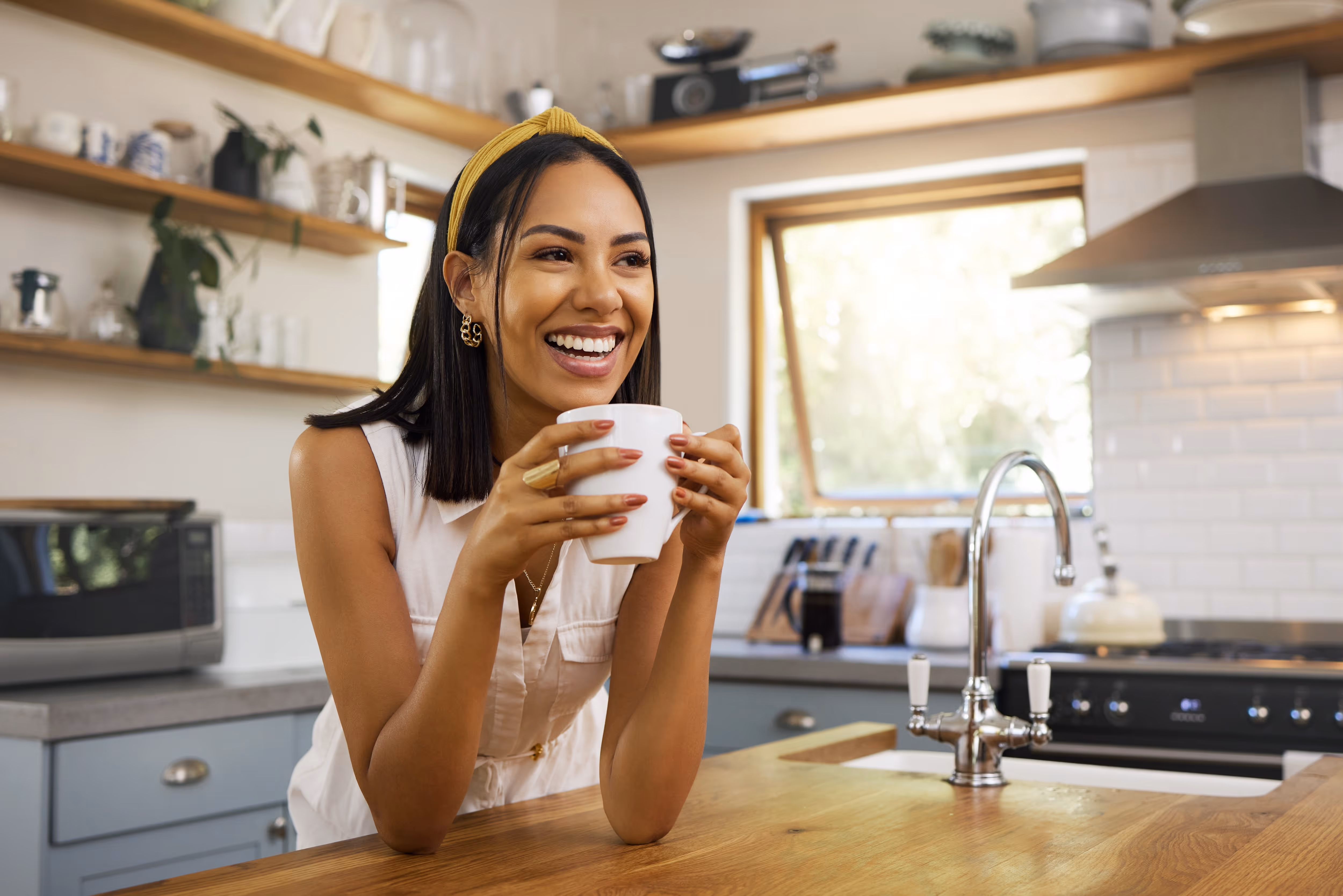 Woman smiling in Kitchen