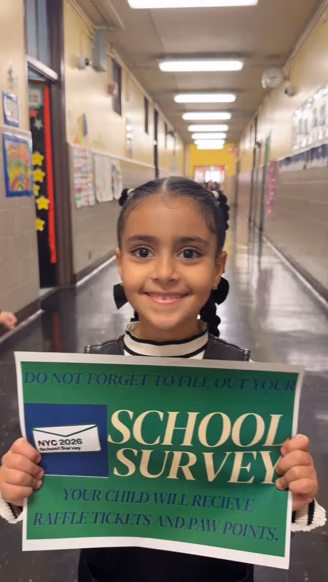 Student with school sign (Dance Team)