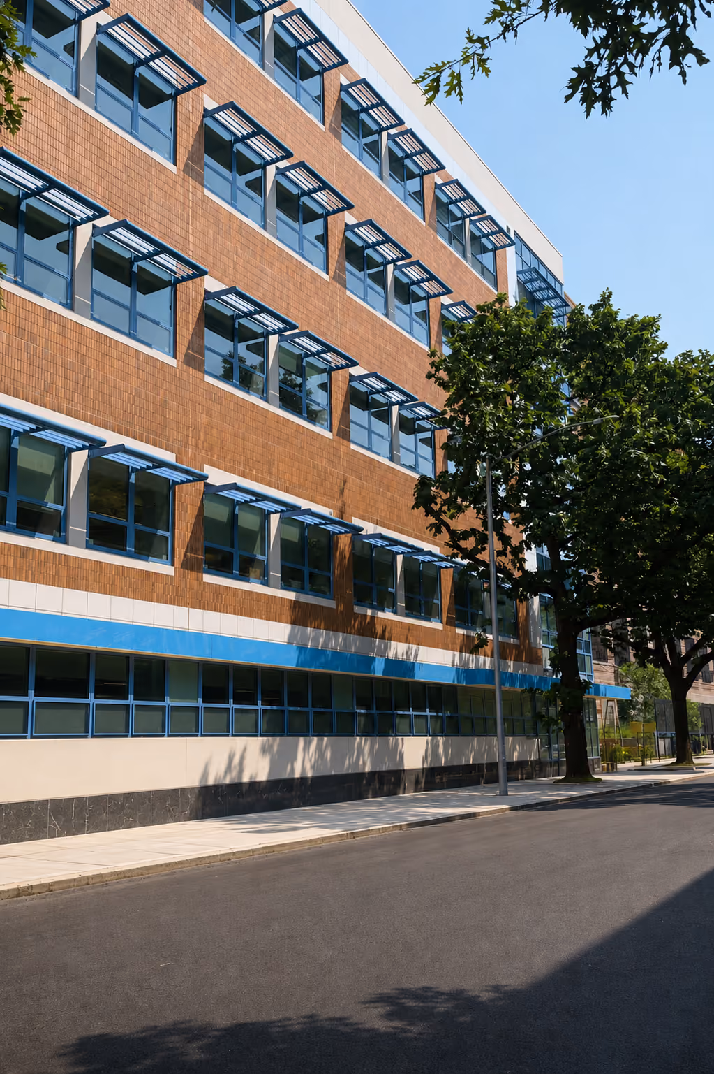 Exterior view of PS 105 multi-story brick school building