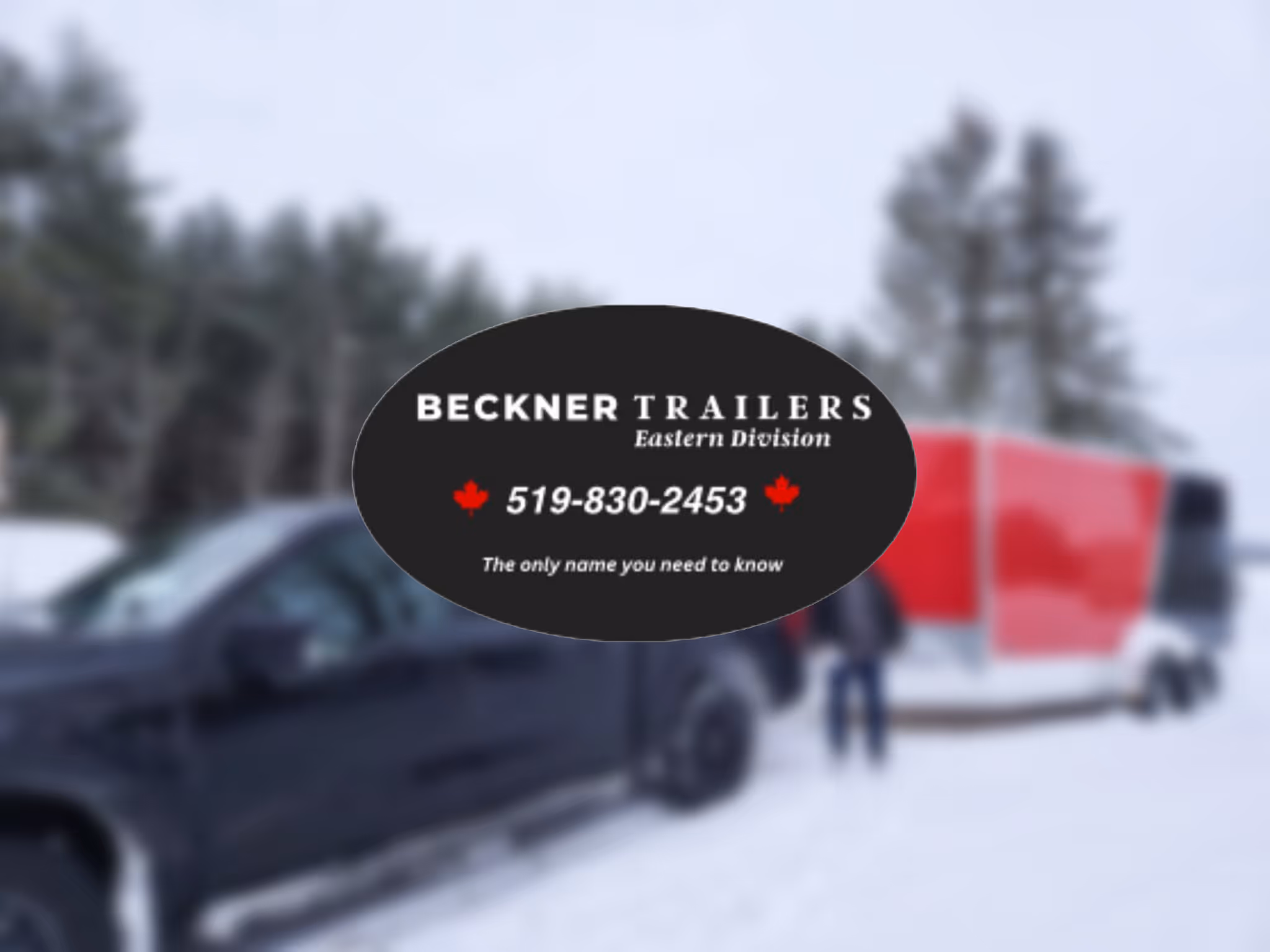 Black truck towing red enclosed trailer in a snowy forest with Beckner Trailers logo overlaid.
