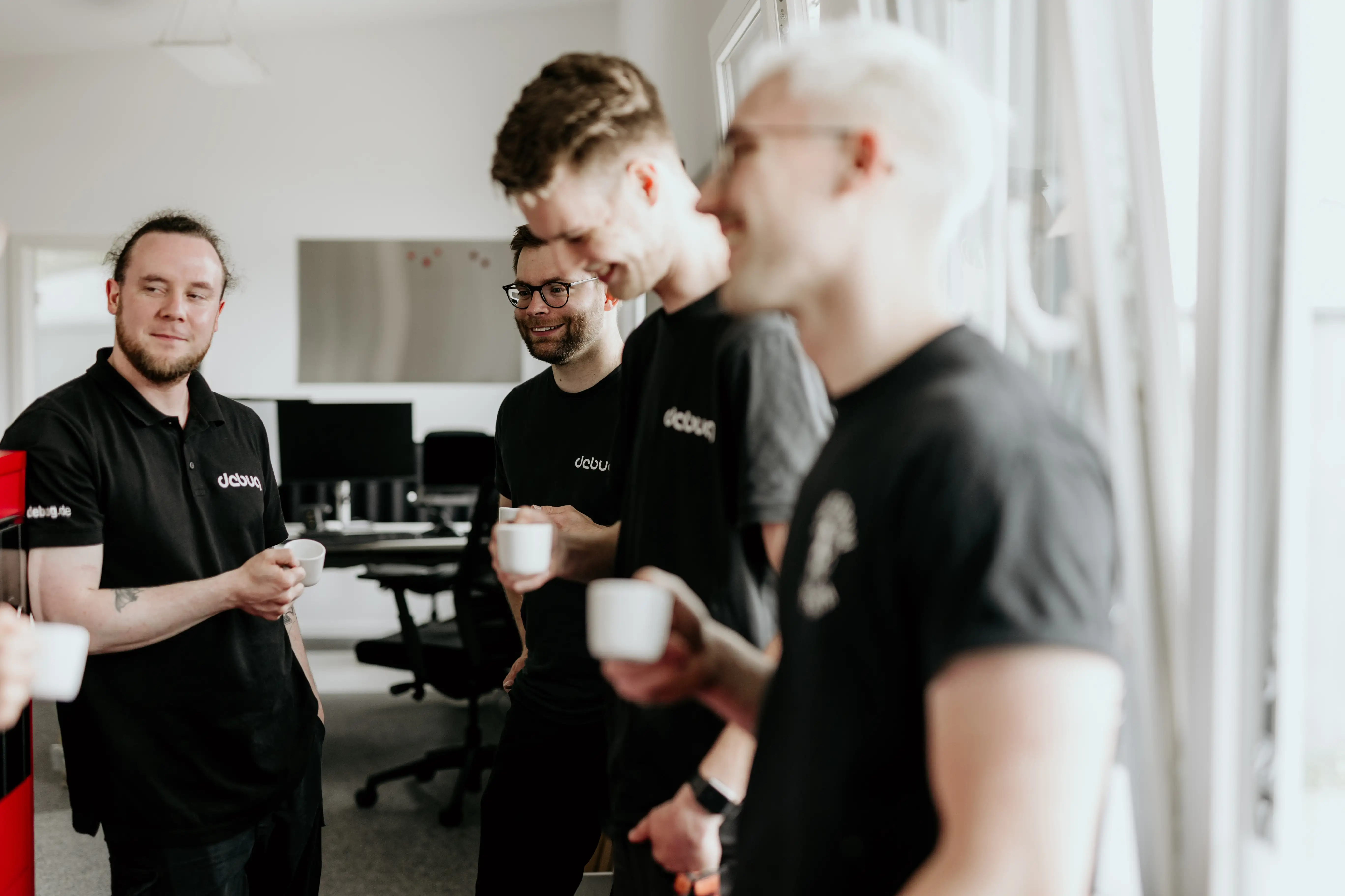 debug Team beim gemeinsamen Kaffeetrinken
