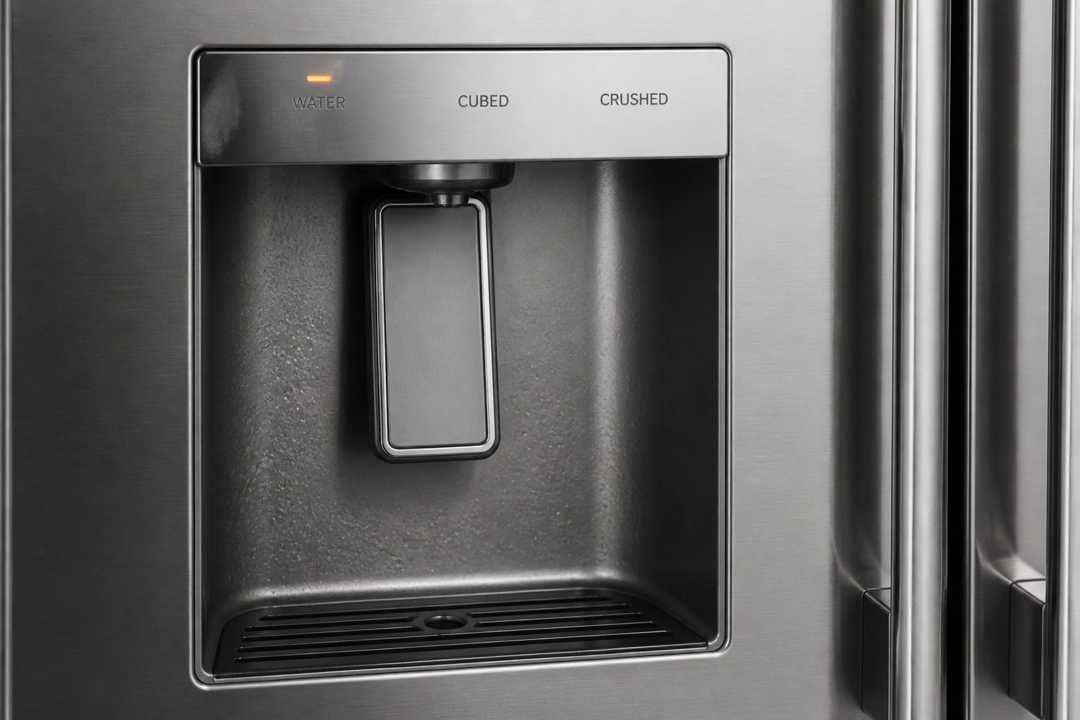 A stainless fridge dispenser overlay labeled WATER, CUBED, and CRUSHED.