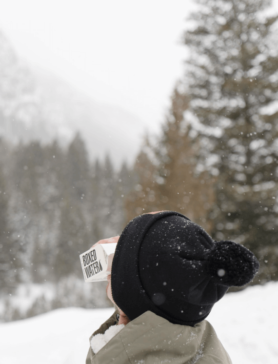 women drinking in freezing ice cold place