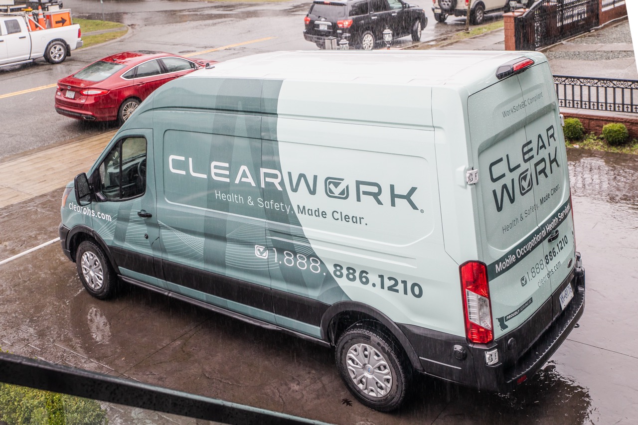 Clear Work mobile health and safety testing van parked on site
