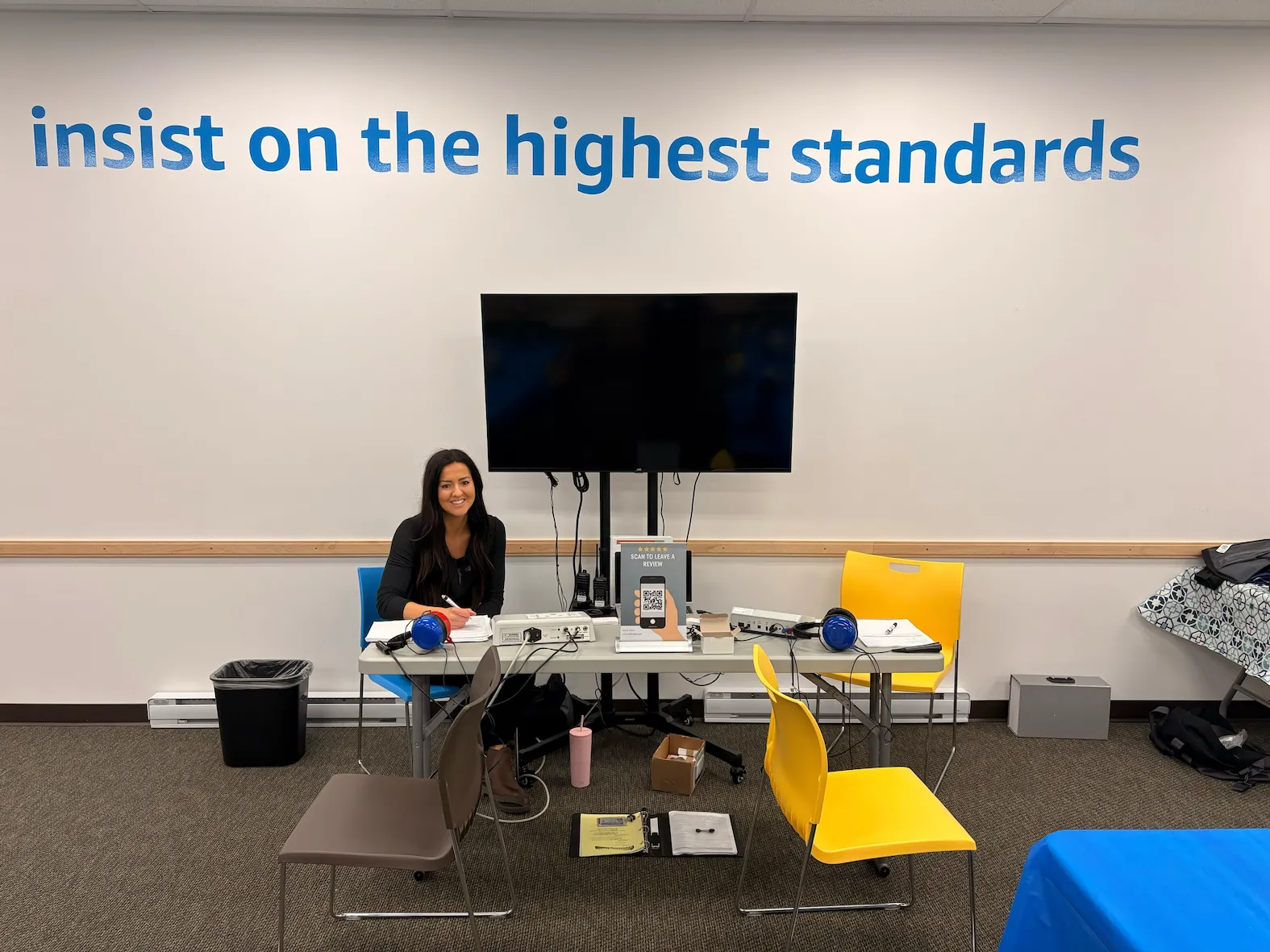 Clear Work technician set up for hearing testing at Amazon's Langley facility