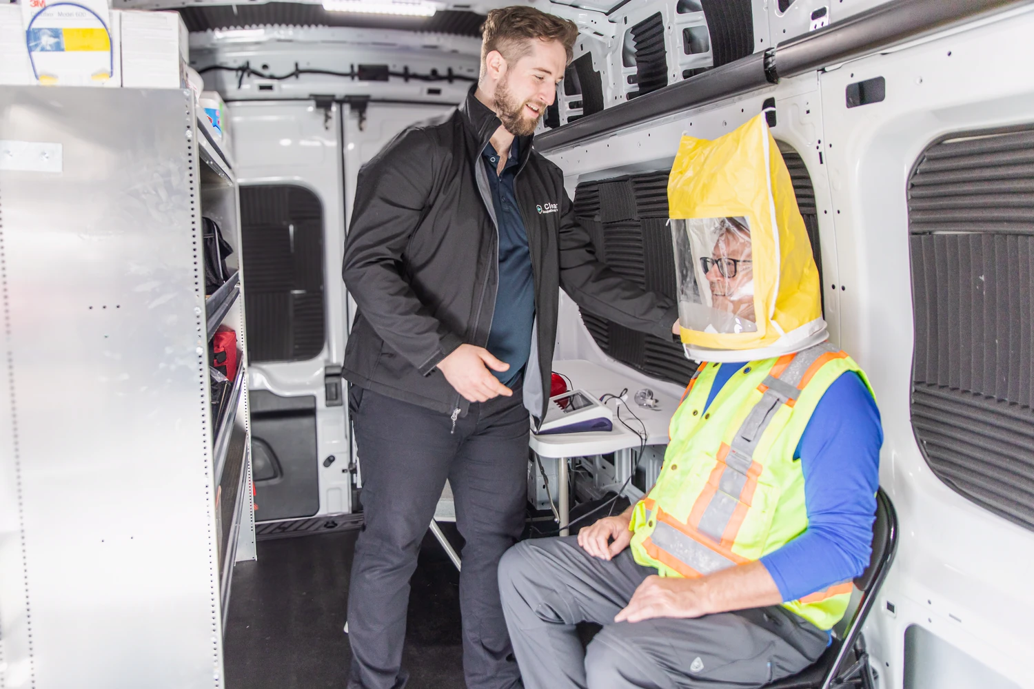 On-site respirator fit test in a Clear Health Group mobile unit for construction crews