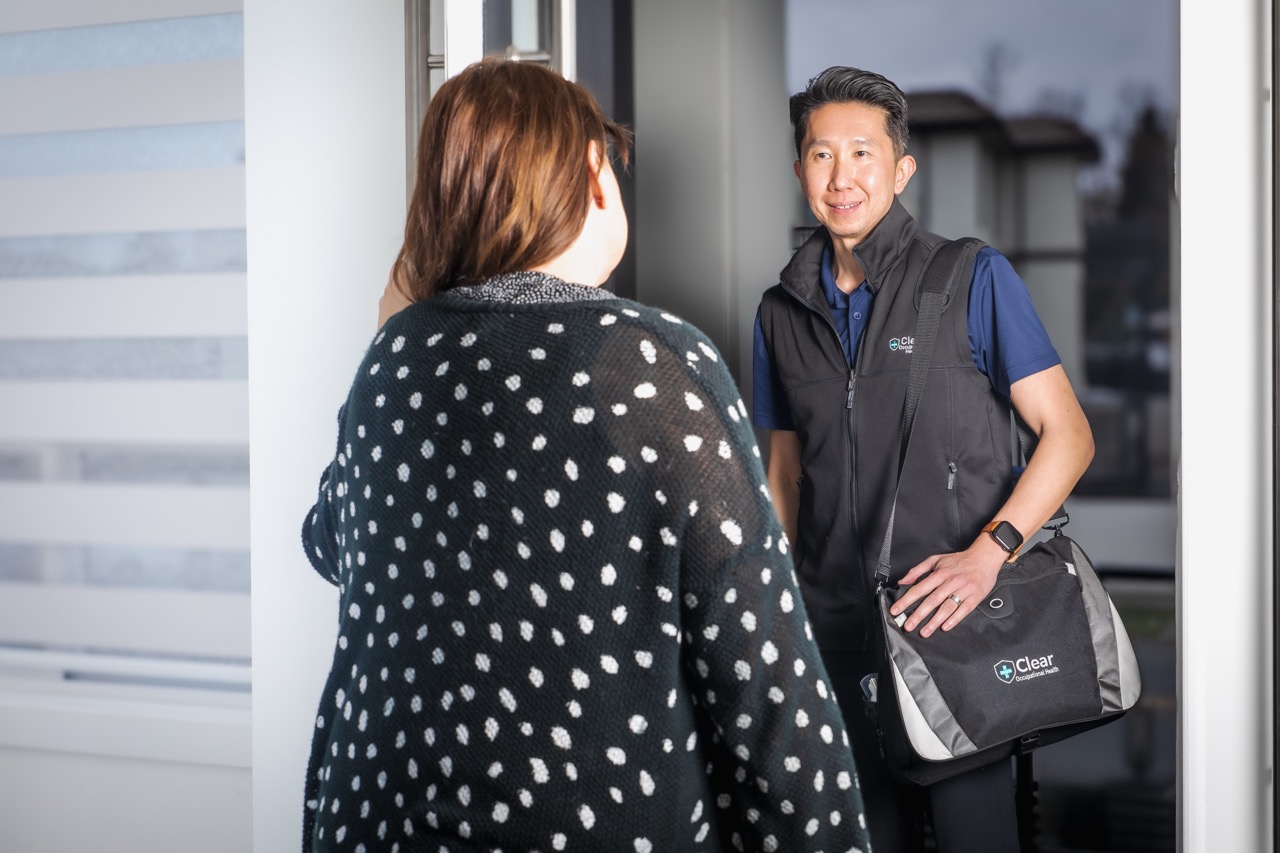Clear Home clinician arriving at a client's home for a hearing aid service visit