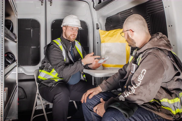 Worker wearing audiometric headphones during an on-site hearing test in Richmond