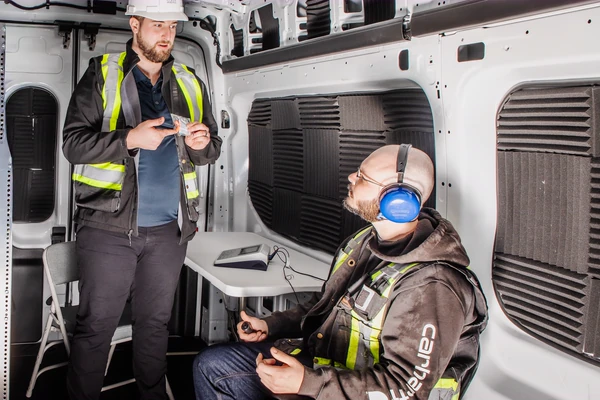 Worker wearing audiometric headphones during an on-site hearing test in Chilliwack