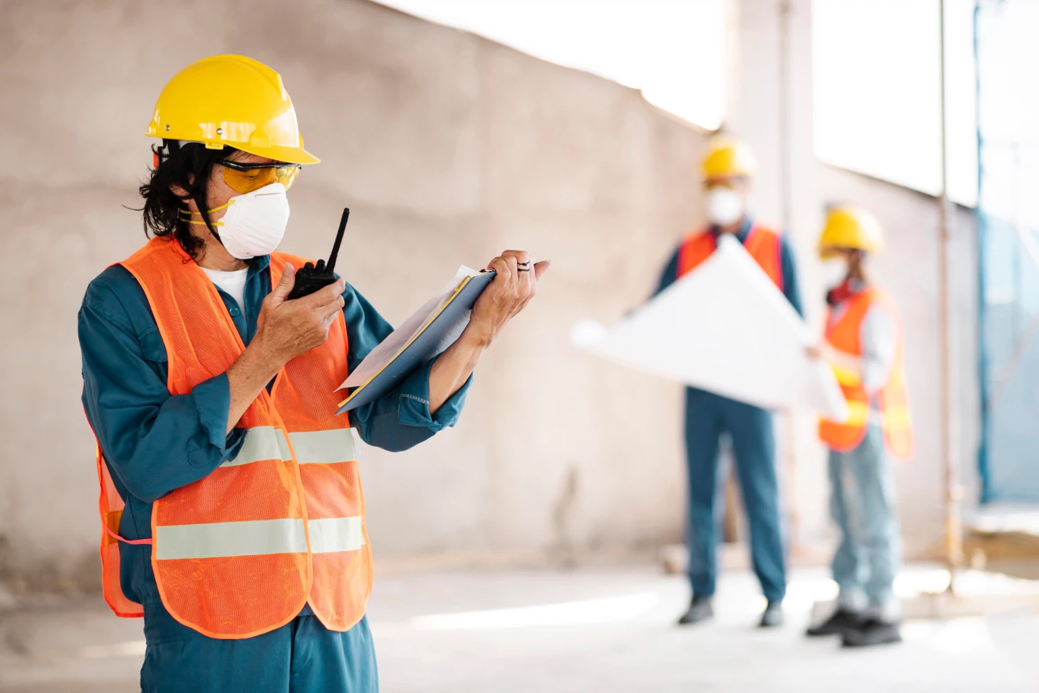 Registered Nurse screening a construction worker on site in British Columbia