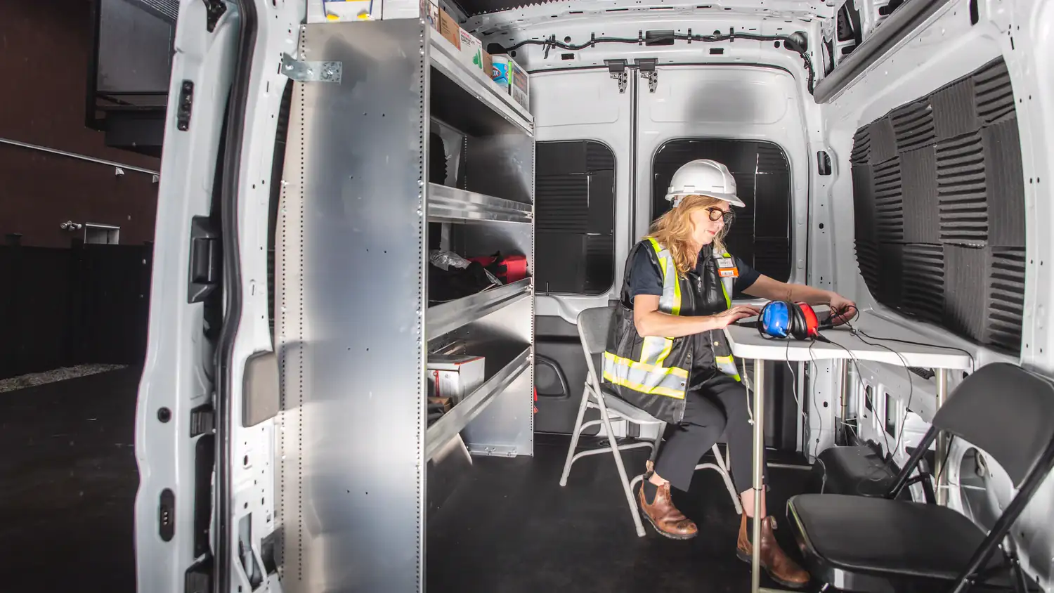 Mobile hearing test inside a Clear Health Group mobile testing unit in Kelowna