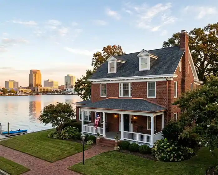 A completed roof replacement project in Norfolk, VA, showcasing the integration of high-performance shingles and precise valley flashing. Built to withstand Tidewater storm cycles and heavy humidity.