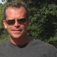 David Richardson, Lead Project Estimator, performing a precision exterior audit to determine window repair vs. full-frame replacement viability in Chesapeake.