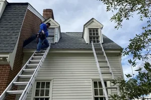 our roofer working on a roof replacement