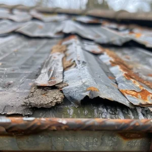 badly rusted and damaged flashing