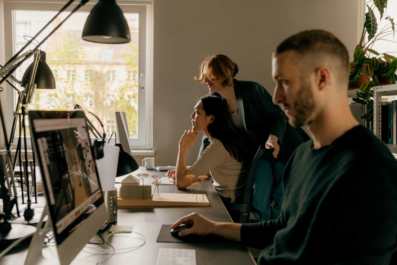 Team working on computers in an office