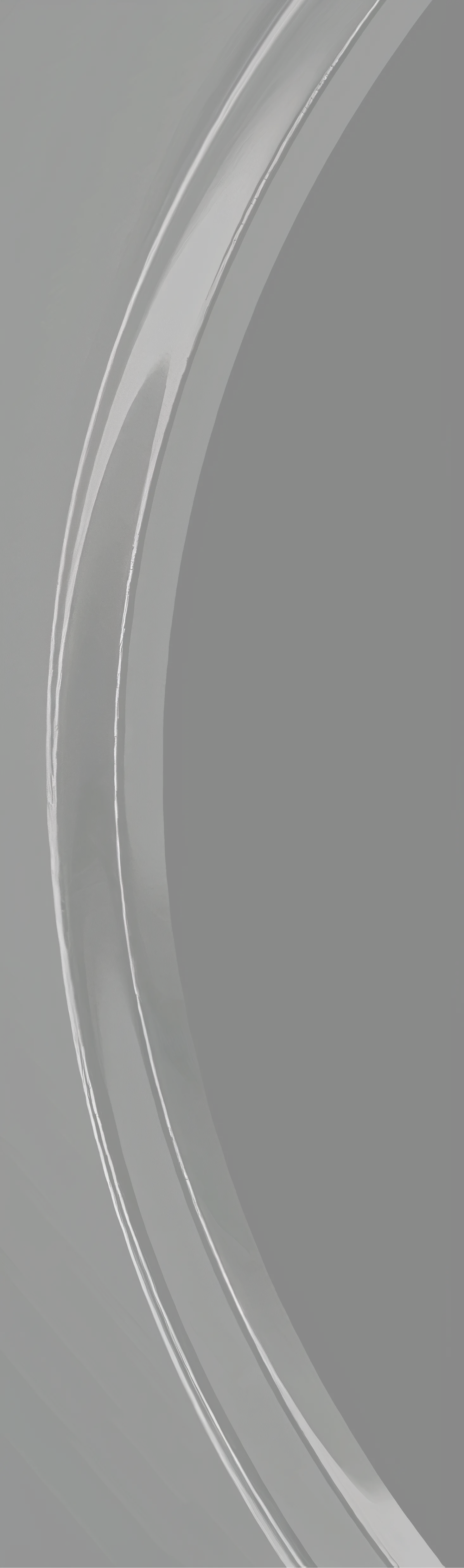 A black background with a silver ring in the center.