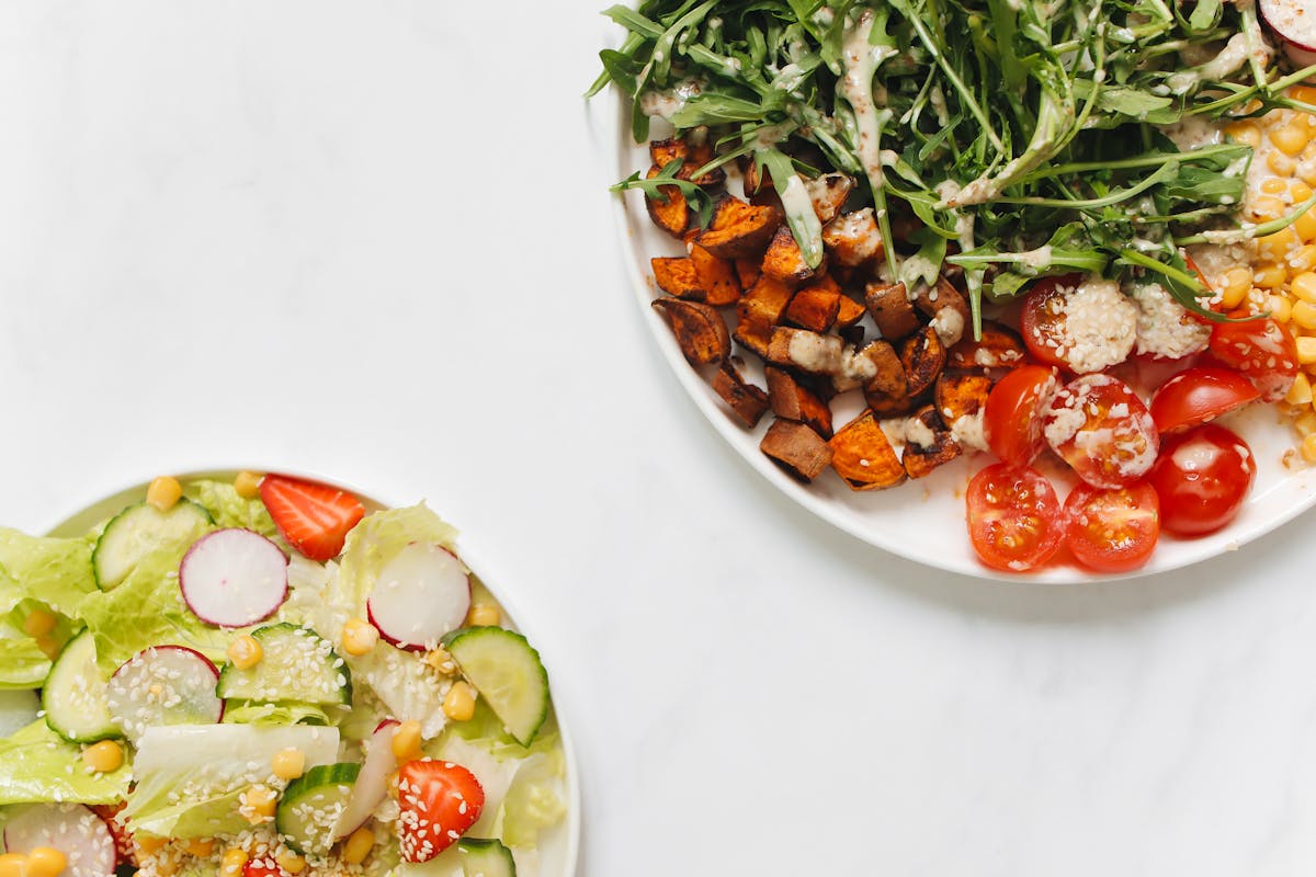 Close-up of plates of healthy food with protein-rich ingredients