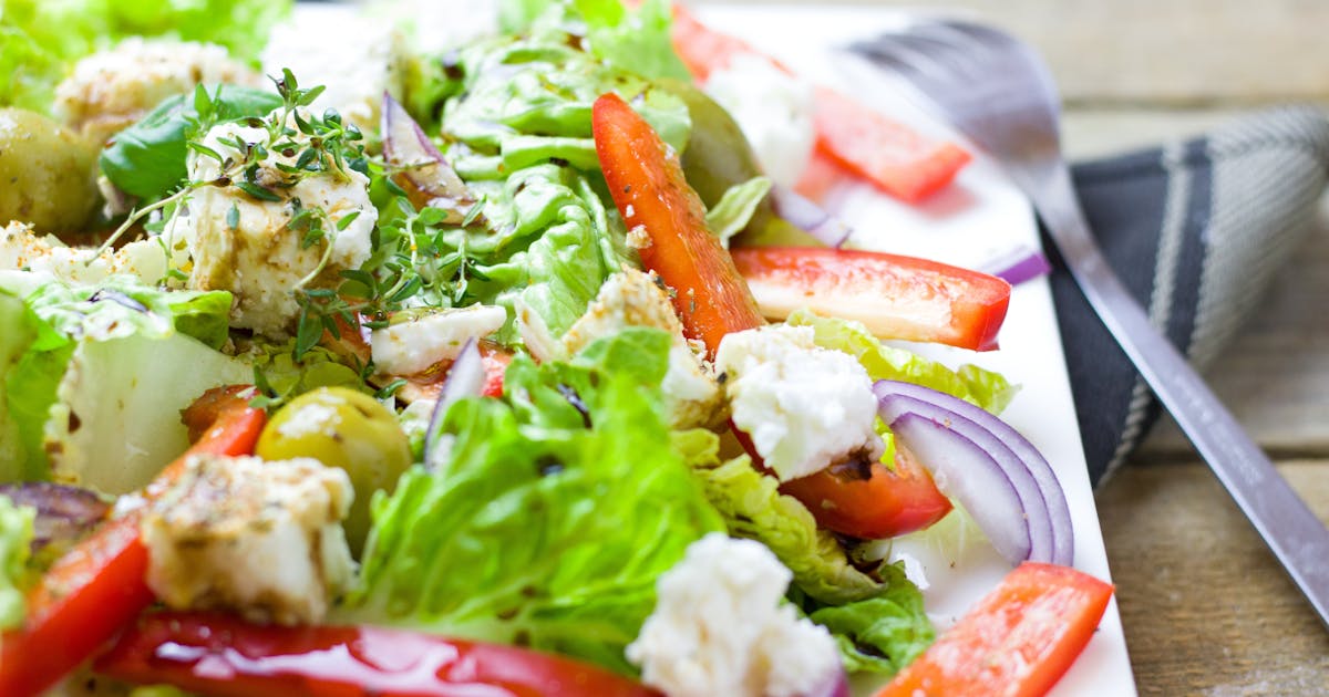 Colorful Greek salad with fresh vegetables and feta cheese