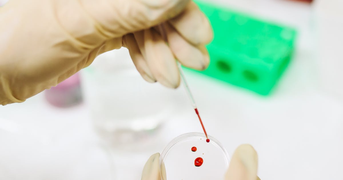 A scientist examining samples in a laboratory