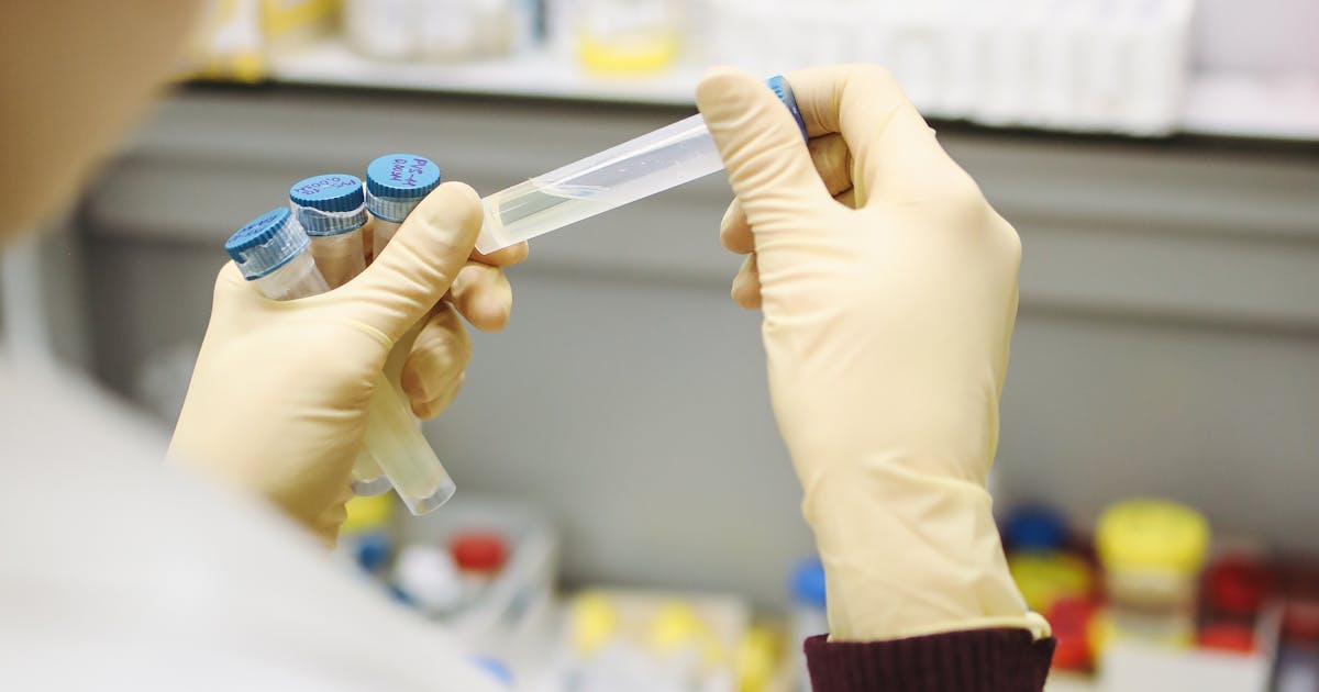 Scientist working in a research laboratory representing CDC and NIAID outbreak response
