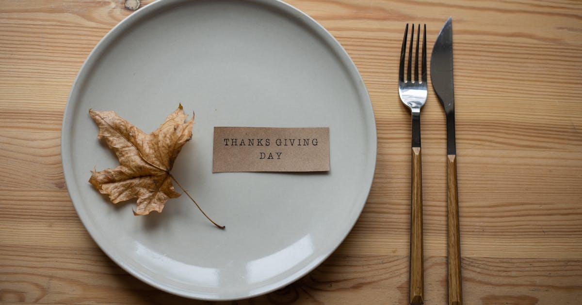 A plate with a fork and knife on a table