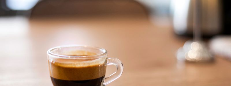 Selective focus photography of a cup of black coffee
