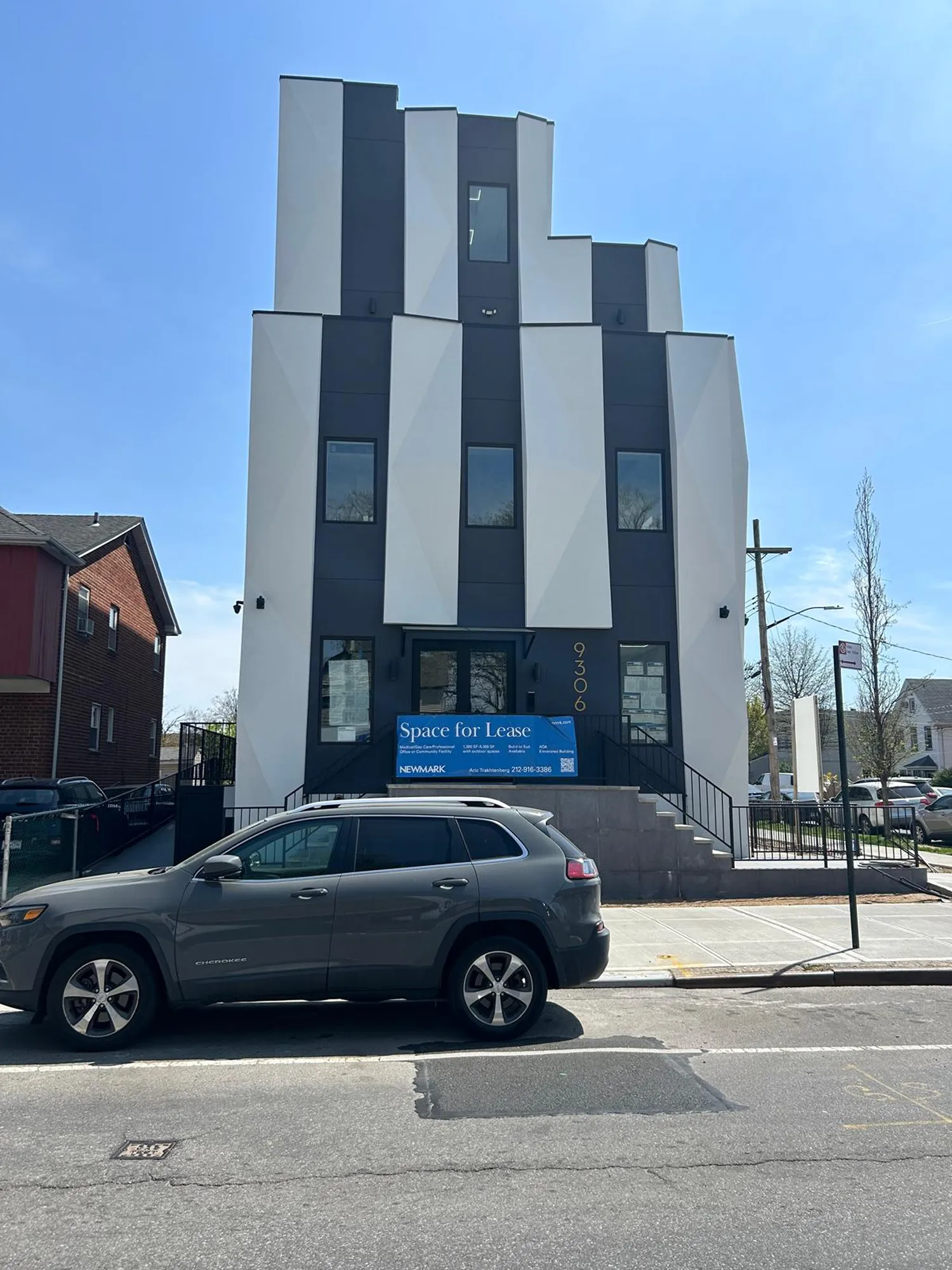 Specialist dentist examining patient at Canarsie Dental
