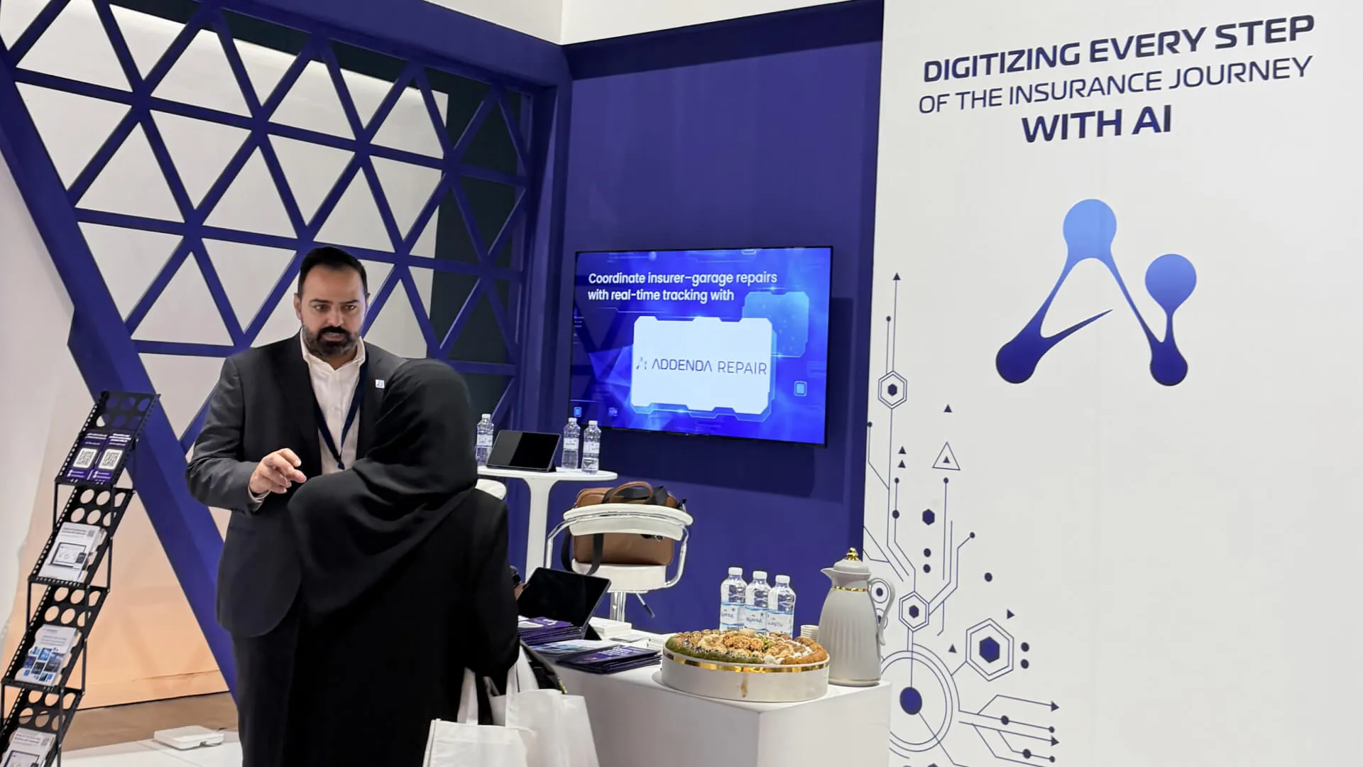 Kayed discussing with a client
