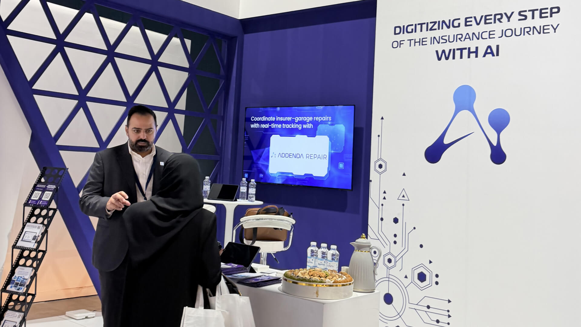 Kayed discussing with a client