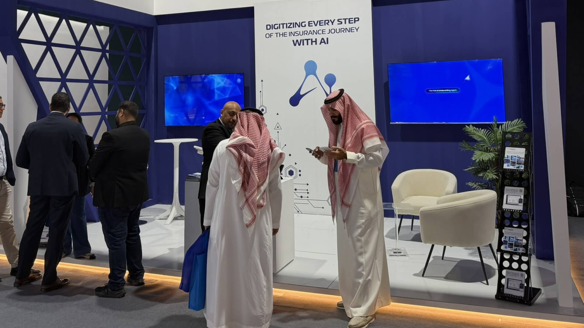 Bashir discussing with local experts at KSA InsurTech