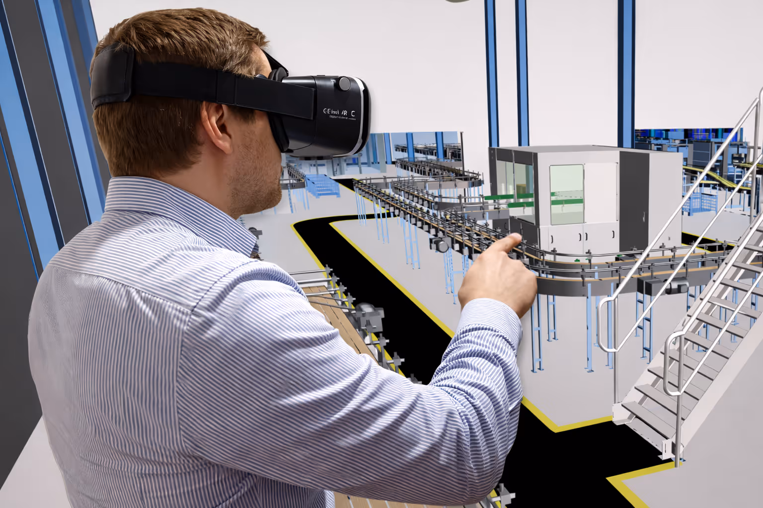 Man wearing a virtual reality headset interacting with a digital model of an industrial conveyor system.