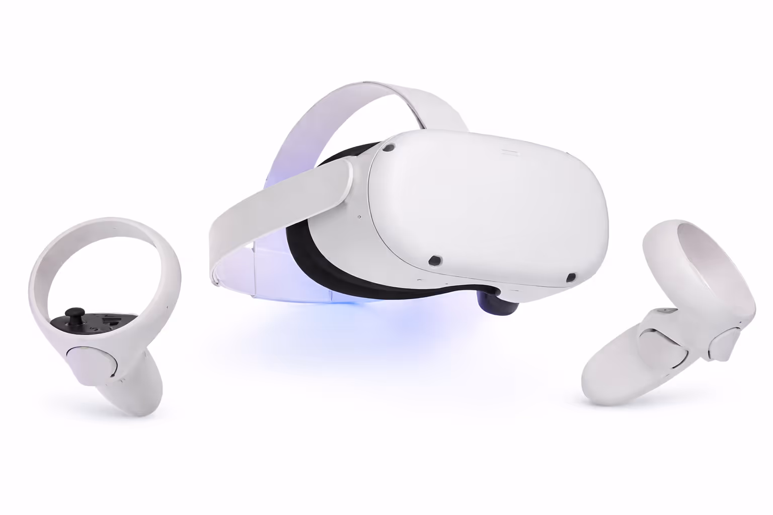 White virtual reality headset with two wireless controllers on a white background.