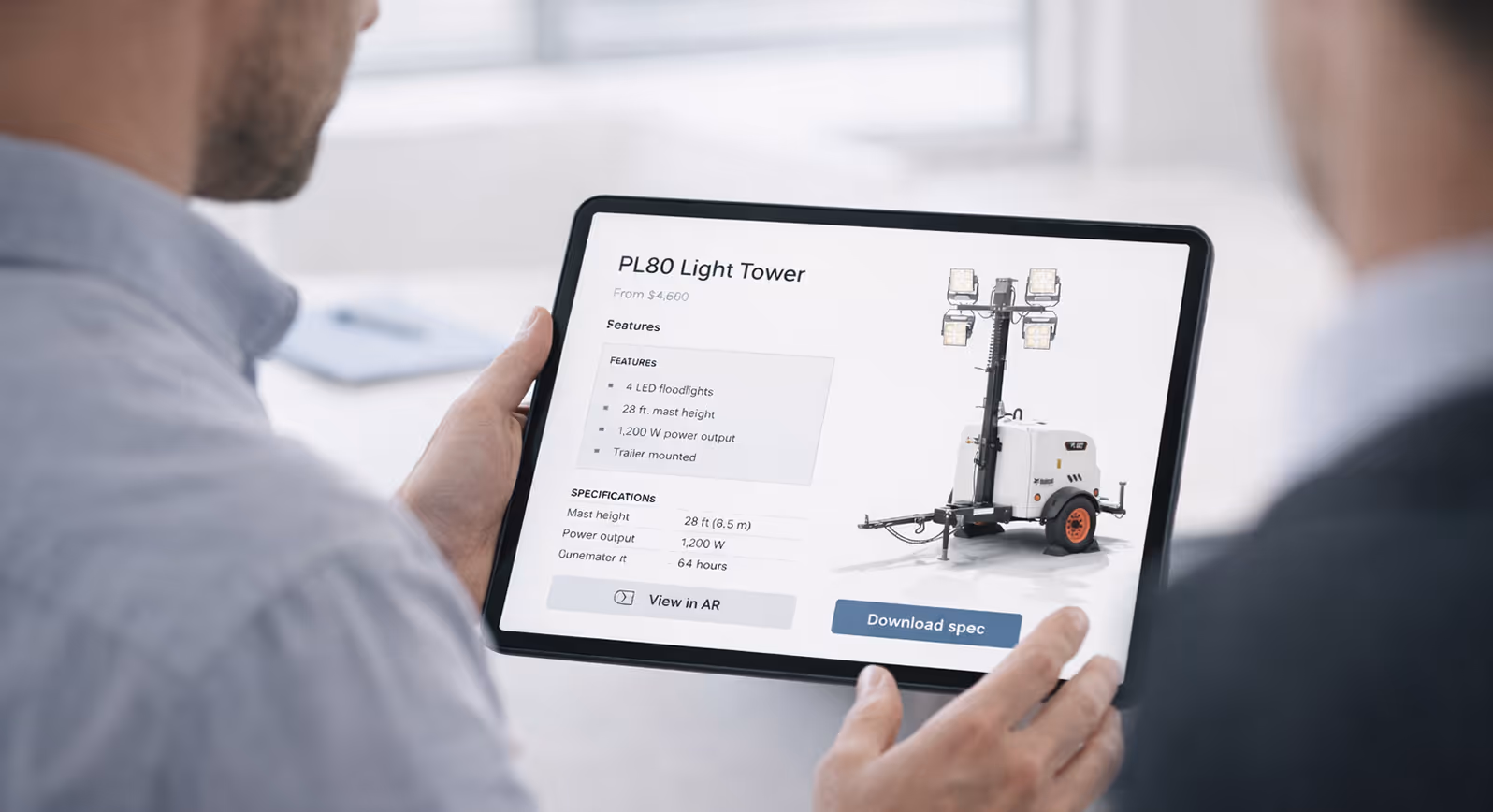 Sales professional using AR tablet to place full-size HVAC unit in client facility