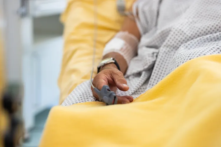 Man in hospital bed