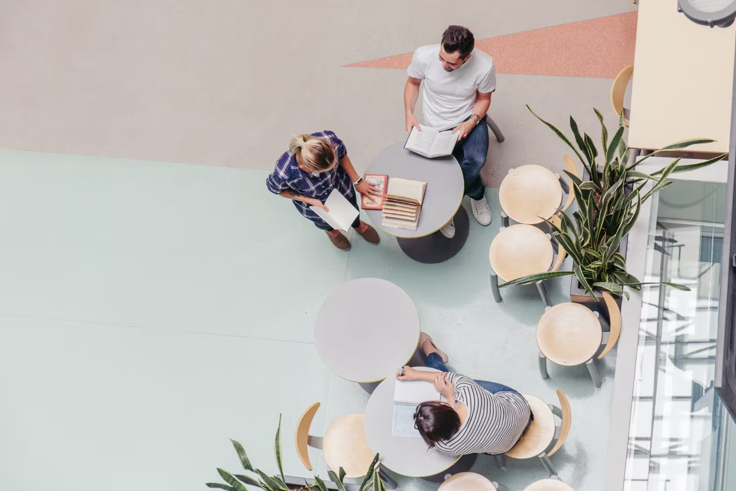Students and learners in a modern education campus environment, aerial perspective