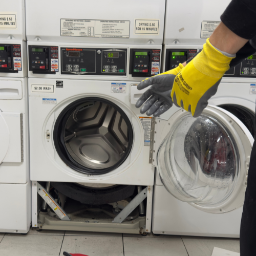 Volt & Vector appliance repair technician at NYC apartment door — how to choose a reliable repair company in Brooklyn