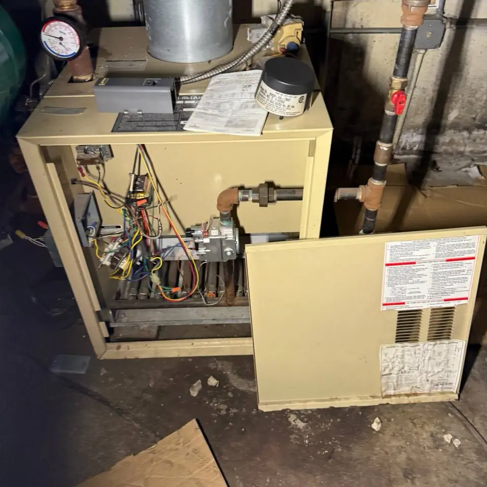 AC condensate drain repair NYC — clearing clogged drain lines in Brooklyn and Manhattan apartments